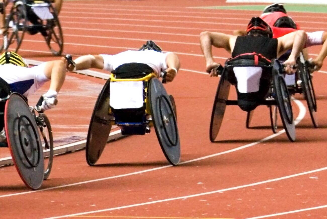 Wheelchair athletes competing on a track