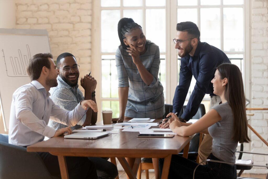 People meeting around a table and talking